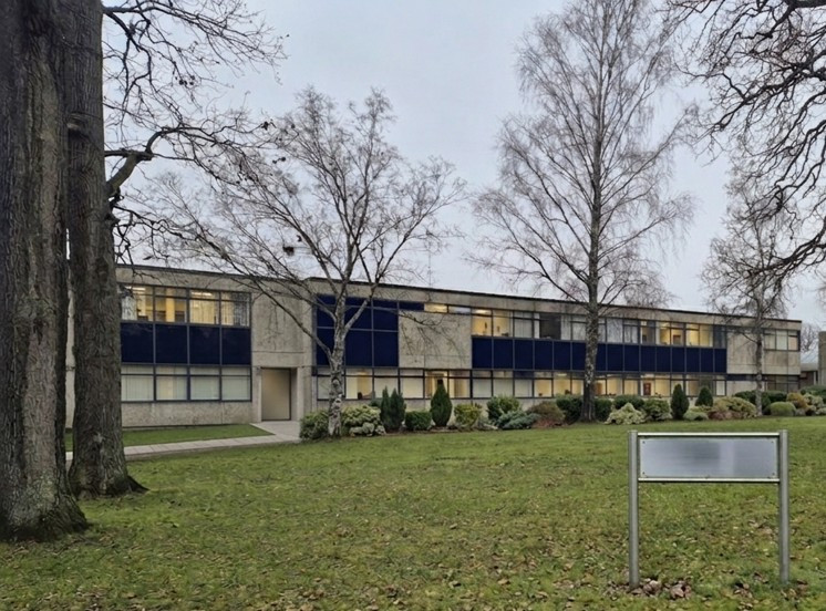 A view of the outside of a 1960s office building